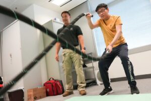 A potential recruit undergoes a physical test at the learning event. Photo: Karma Lo