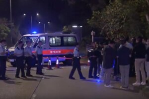 Police officers fire 5 shots at charging armed assailant, hitting him twice