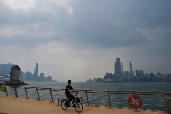 A man cycles along the promenade at East Coast Park, Fortress Hill, on a day of poor air quality on July 25, 2025. Clean air is one of the five natural capital assets identified in the Hong Kong Nature-based Solutions Design Guidelines. Photo: Elson Li