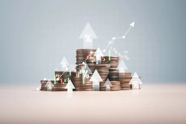 A sack of coins and a chart with a growth trend.