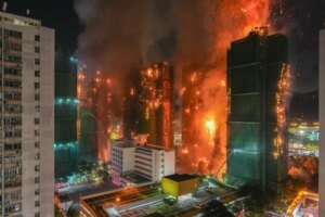 Firefighter killed in Tai Po blaze may have entered wrong building, inquiry told