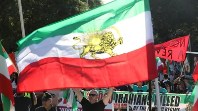 (File photo). People march in support of nationwide protests in Iran, Los Angeles, California, earlier this year with a banner at the back noting that several Iranians have been killed. REUTERS/Jill Connelly (REUTERS)