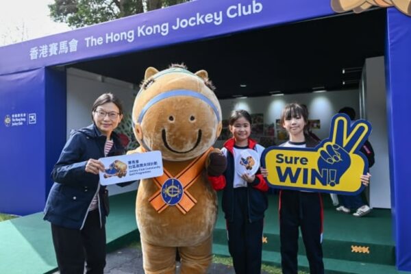 Anita Fung, Steward of The Hong Kong Jockey Club (1st left) visits the Jockey Club booth.