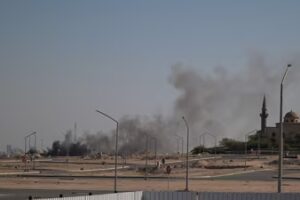Smoke rises from a reported Iranian strike in the area where the US Embassy is located in Kuwait City (AFP)