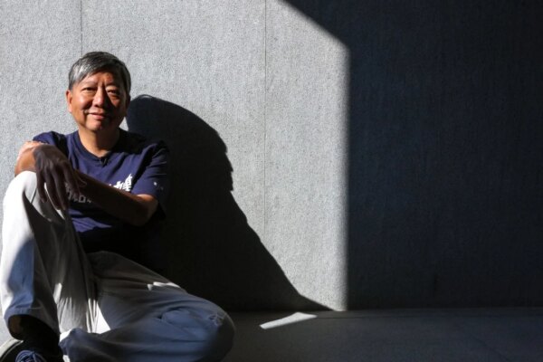 Former Hong Kong lawmaker denies abetting criminal activity in mainland China