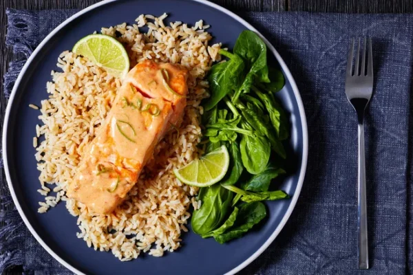 Salmon on brown rice with greens