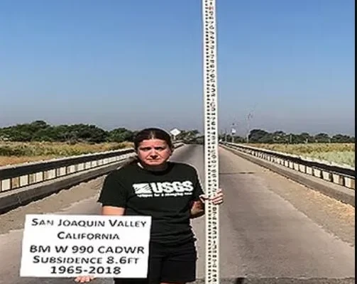 Retired U.S. Geological Survey hydrologist Michelle Sneed displays the depth of subsidence in the San Joaquin Valley between 1965 and 2018.