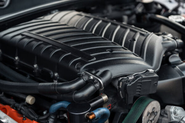 An image of a supercharger installed in an engine