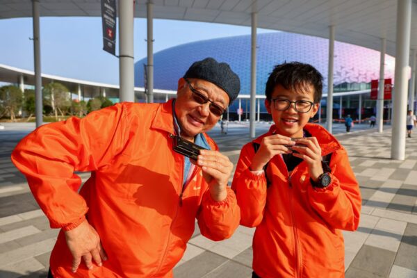 Alan Chan and his grandson Ethan with their harmonicas. Photo: Dickson Lee