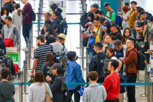 Travellers stranded at Hong Kong airport as some 27 Middle East flights disrupted