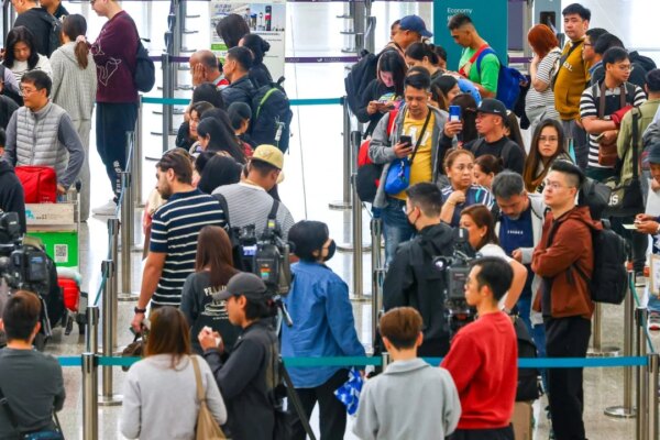 Travellers stranded at Hong Kong airport as some 27 Middle East flights disrupted