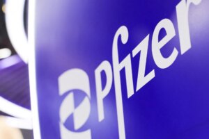 Which global firms are being attracted by Hong Kong’s strategic enterprise scheme?