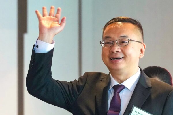 Hong Kong immigration chief granted service extension past retirement age