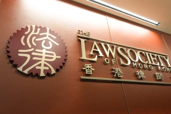 Hong Kong Law Society closes firm linked to crash-for-cash scams