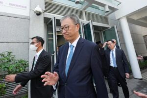 Justice David Lok, the independent committee’s chairman, outside City Gallery in Central, where the hearing is being held. Photo: Jelly Tse