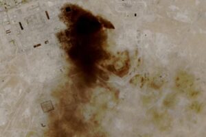 A satellite view of smoke billowing at a Saudi Aramco oil facility after a reported attack by Iranian drones (via REUTERS)