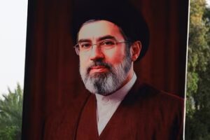 A man holds a poster of Iran's new Supreme Leader, Mojtaba Khamenei, during a solidarity rally in support of Iran and against Israel and the United States. (REUTERS)