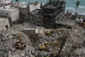 Excavators remove rubble from buildings destroyed in Israeli airstrikes on Thursday as rescuers search for victims in the city of Tyre, southern Lebanon, Saturday, April 18, 2026. (AP)