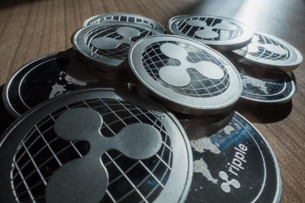 Ripple XRP crypto currency coins stack on table