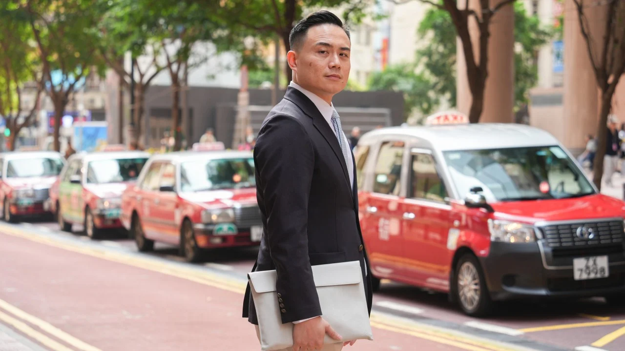 Some Hong Kong taxi drivers unprepared as new e-payments rule takes effect