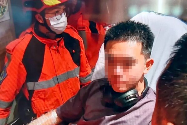 Hong Kong police arrest man after fire inside sports store injures staff member