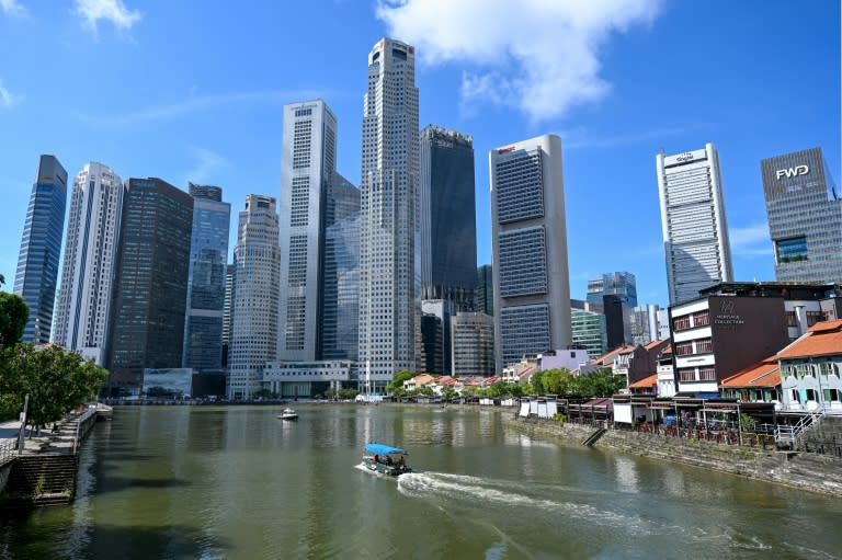 Singapore-washing is a trend where Chinese firms move to the city state in order to attract overseas funding, a laxer regulatory environment or to appeal to a global customer base without an explicitly Chinese image (Roslan RAHMAN)