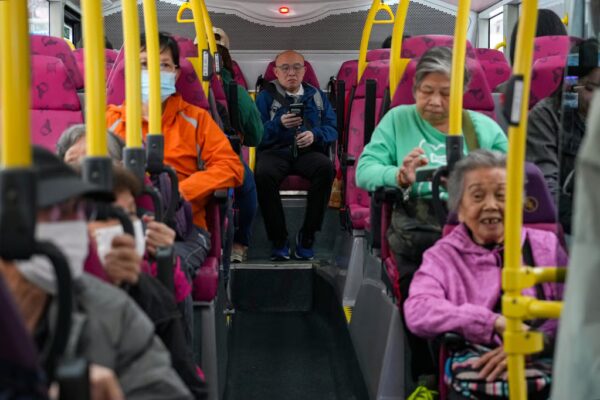 Passengers on a double-decker bus in Sham Shui Po on January 25. Photo: Sam Tsang