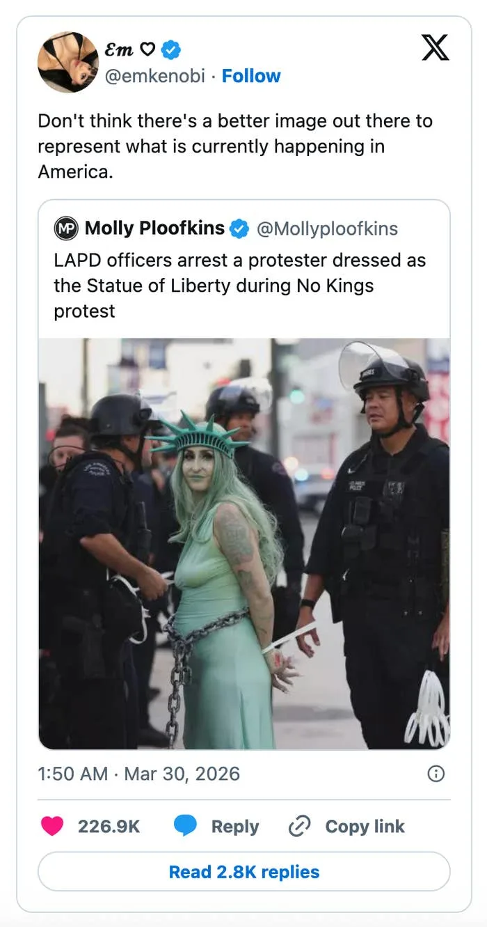 Tweet showing a meme of LAPD officers arresting a person dressed as the Statue of Liberty during a protest