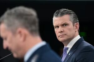 Secretary of Defense Pete Hegseth, right, said the Pentagon’s goal is to destroy Iran’s missiles, drones and navy.