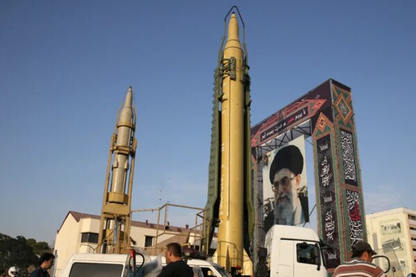 A Ghadr-H missile, center, a Sejjil missile and a portrait of the Iranian Supreme Leader Ayatollah Ali Khamenei are on display for the annual Defense Week, marking the 37th anniversary of the 1980s Iran-Iraq war, at Baharestan Sq. in Tehran, Iran, Sunday, Sept. 24, 2017. Iran's elite Revolutionary Guard also displayed the country's sophisticated Russian-made S-300 air defense system in public for the first time. (AP Photo/Vahid Salemi)