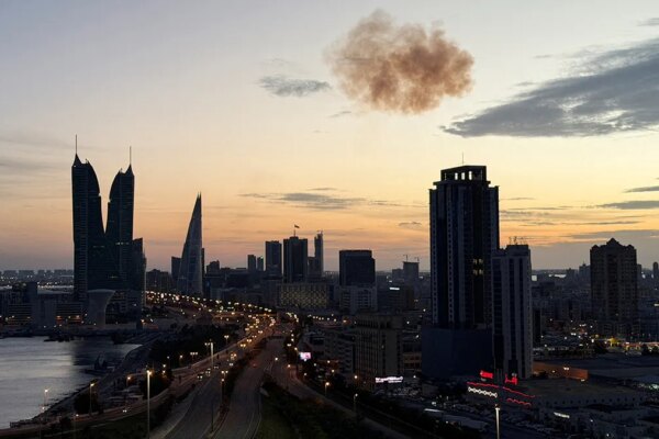 Smoke rising over the Bahrain Financial Harbour towers in Manama.
