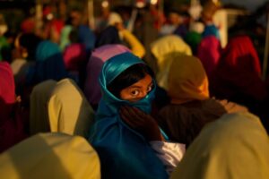 A devotee dressed as a townsperson takes part in a Way of the Cross reenactment in Arraijan, Panama, Good Friday, April 3, 2026. (AP Photo/Matias Delacroix)
