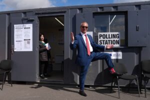 Reform UK leader Nigel Farage arrives to cast his vote in the local elections in Walton-on-the-Naze, Essex