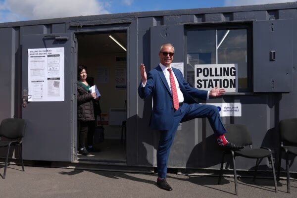 Reform UK leader Nigel Farage arrives to cast his vote in the local elections in Walton-on-the-Naze, Essex