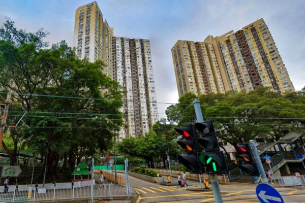 Debt-ridden Hong Kong merchant pleads guilty to attempted murder of family in flat