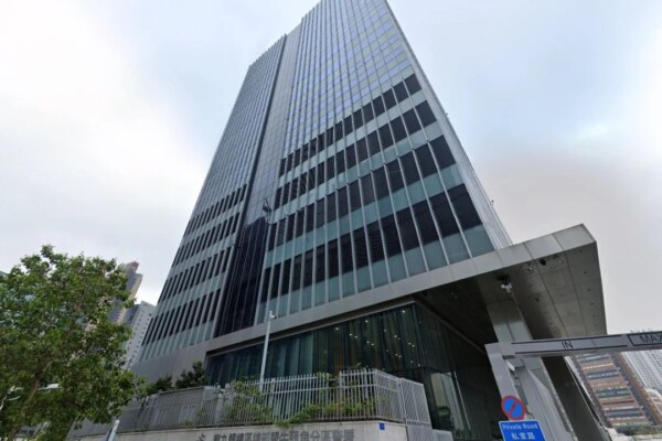 Hong Kong police officer fires service pistol by mistake at Kai Tak headquarters