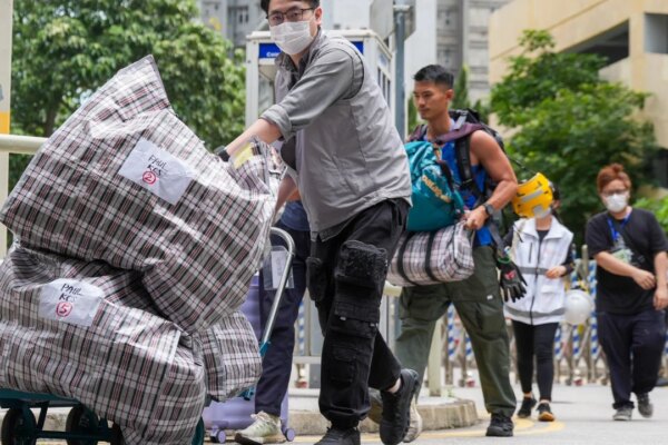 Hong Kong banks replace burnt cash from residents of fire-ravaged Wang Fuk Court