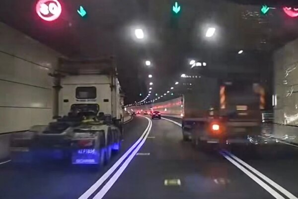 Hong Kong police arrest 2 drivers over alleged truck racing viral video