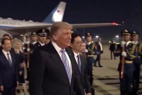 Trump arrives in China for high-stakes summit