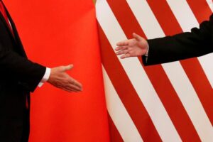 US President Donald Trump and China's leader Xi Jinping shake hands at the Great Hall of the People in Beijing, China, November 9, 2017.