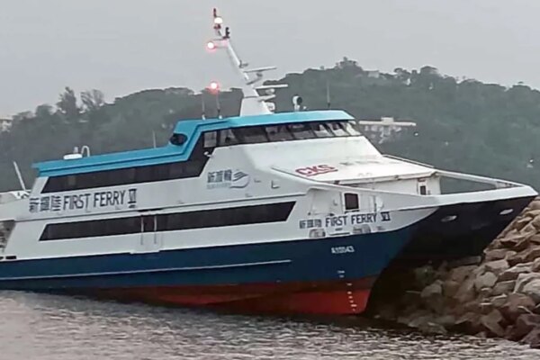 Ferry passengers stranded over an hour after vessel hits typhoon shelter barrier