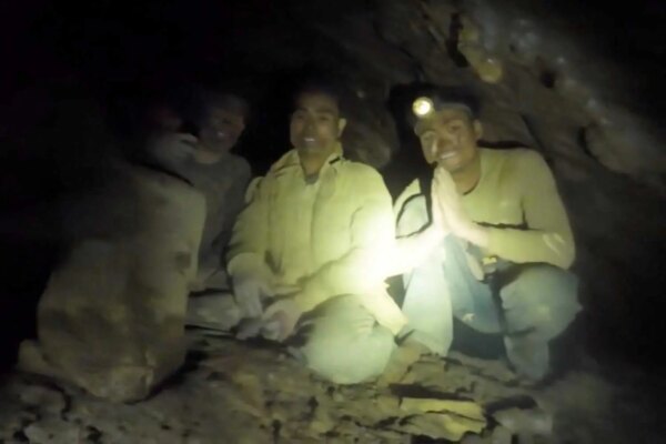 Rescuers Reach Five Miners Trapped in Laos Cave