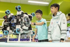 According to Lucas (left), the team’s chief technology officer, OctoScope is a modular autonomous underwater vehicle with interchangeable sensors and an octopus-inspired gripper.