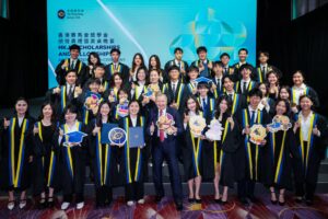 The Hong Kong Jockey Club CEO Winfried Engelbrecht-Bresges (centre) with JC Scholars.