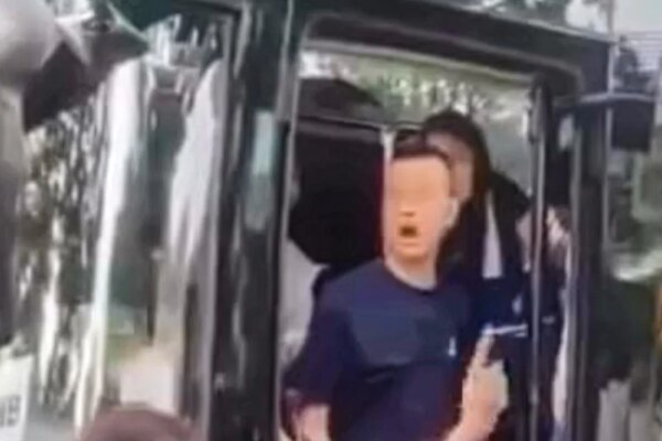 Singapore investigates Hong Kong school principal for swearing at security guards