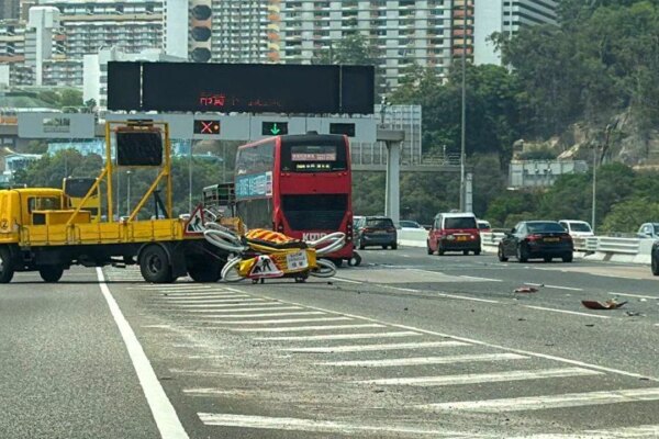 24 injured after double-decker KMB bus crashes into highway maintenance truck