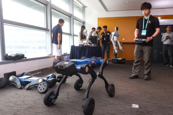 The AI lab will refine Hong Kong-made robotic arms and quadrupeds as it works towards long-term humanoid designs. Photo: Edmond So