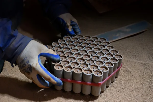 File: In this photo taken on 22 January 2026, a man works at a fireworks factory in Liuyang town, Changsha, central China's Hunan province (AFP via Getty Images)