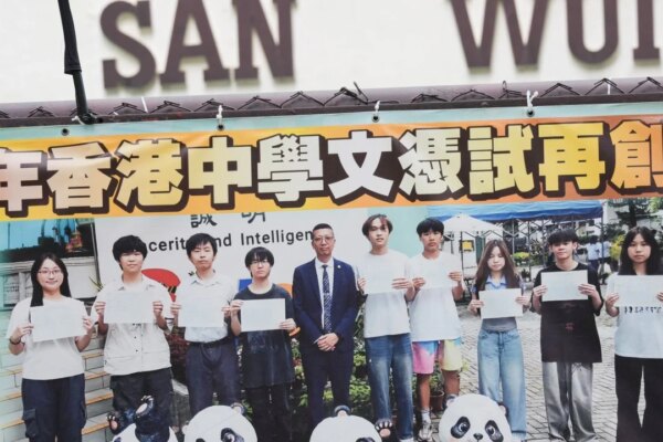 Students divided over Hong Kong principal’s resignation after Singapore clash