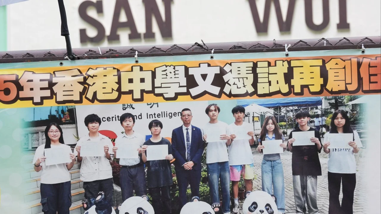 Students divided over Hong Kong principal’s resignation after Singapore clash